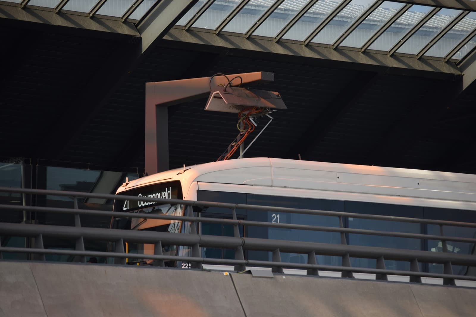 Electric bus depot with rows of buses charging overnight
