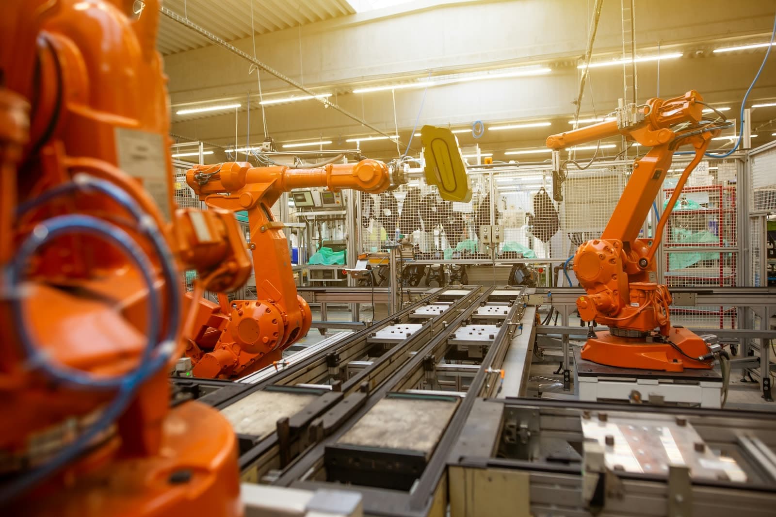 Industrial manufacturing facility with production line and material flow